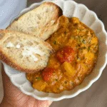 Healing Harissa Butter Beans Anti-Inflammatory Stew in a rustic bowl